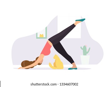 Downward-facing dog. Woman doing Yoga with cat