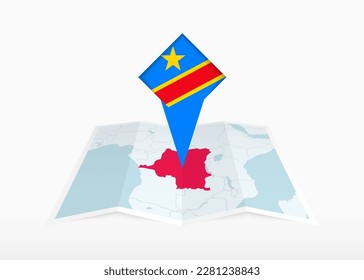 DR Congo is depicted on a folded paper map and pinned location marker with flag of DR Congo. Folded vector map.