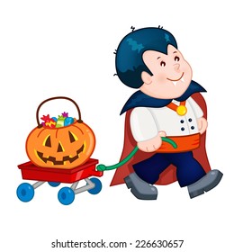 Dracula Halloween Costume Child in Halloween costume pulling a cart full of candy treats.