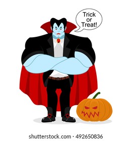 Dracula and pumpkin. Serious Powerful vampire guards vegetable. Strong demon crossed his arms. Red cape. trick or treat. Halloween illustration
