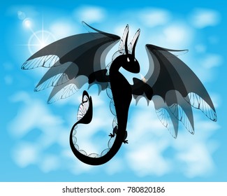 dragon. black fire dragon against the blue sky with clouds