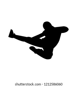 Dragon flying kick black silhouette, isolated 