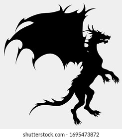 Dragon preparing for takeoff. Silhouette of a winged snake, mythological character of fairy tales. Fantastic creature growls.