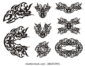 Dragon set in tribal style. Tattoos of the dragon head and dragon butterflies. Black on the white
