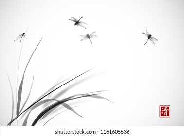 Dragonflies flying over the grass. Traditional oriental ink painting sumi-e, u-sin, go-hua. Hieroglyph - clarity