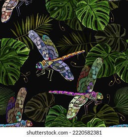 Dragonflies and palm leaves. Jungle forest. Embroidery art. Fashion template for clothes, print. Tropical seamless pattern