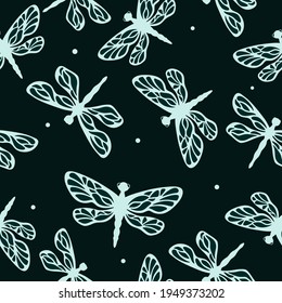 Dragonflies with simple decorative shapes and light dots on a dark turquoise background. Seamless insect style pattern. Suitable for wrapping, textile.