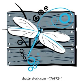 dragonfly against the stylised fence