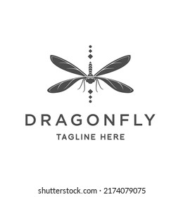 dragonfly logo design concept, a flying dragonfly icon in black color.