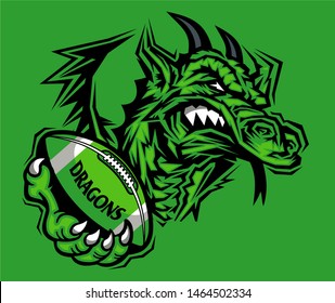 dragons football mascot holding ball in claw for school, college or league
