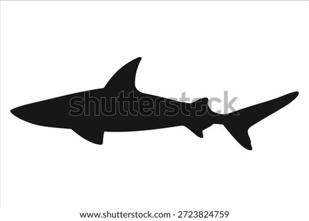 Dramatic black shark silhouette conveying power and speed in ocean waters