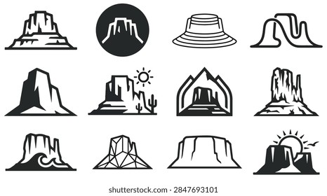 A dramatic desert scene featuring towering hoodoo monoliths and rugged rock formations rising over a barren landscape under a wide open sky