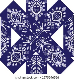 Drapery ikat navajo motif etnic white tribal ornamentalpattern on blue background. Surface background design for cotton fashion. Textile fabric ornament rug.