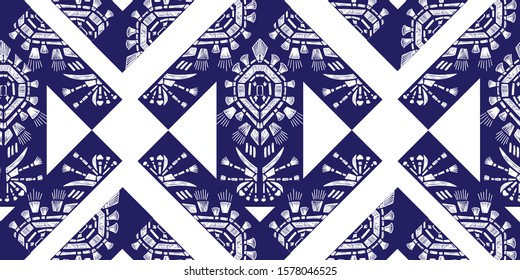Drapery ikat navajo motif etnic white tribal ornamentalpattern on blue background. Surface background design for cotton fashion. Textile fabric ornament rug.