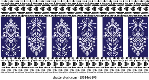 Drapery ikat navajo motif etnic white tribal ornamentalpattern on blue background. Surface background design for cotton fashion. Textile fabric ornament rug.