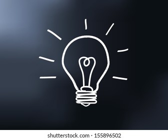 Drawing of a bulb idea on black board vector