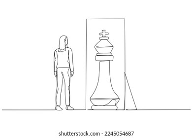 Drawing of business woman standing infront of mirror seeing inner king chess piece concept of positive mindset. Single continuous line art style