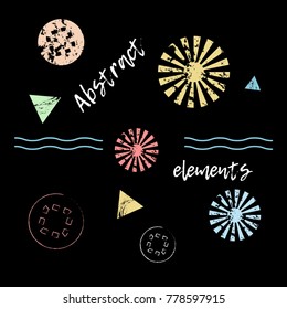 Drawing with chalk. The sun, waves, triangles, text and other abstract shapes, elements. Black background.