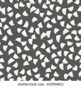 Drawing chaotically scattered smears. Vector seamless pattern. Black and white