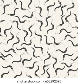 Drawing chaotically scattered wavy smears. Vector seamless pattern. White and black
