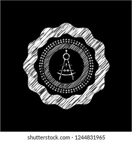 drawing compass icon drawn on blackboard