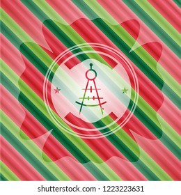 drawing compass icon inside christmas colors badge.