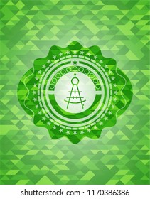 drawing compass icon inside green emblem with triangle mosaic background