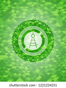 drawing compass icon inside green emblem with triangle mosaic background