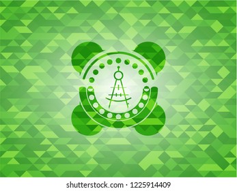 drawing compass icon inside green emblem. Mosaic background