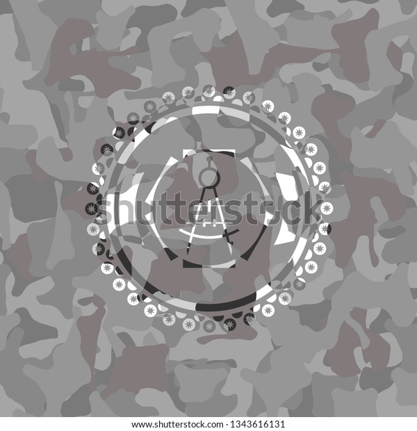 drawing compass icon\
inside grey camo\
emblem