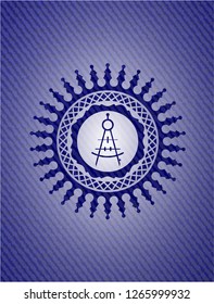 drawing compass icon inside jean or denim emblem or badge background