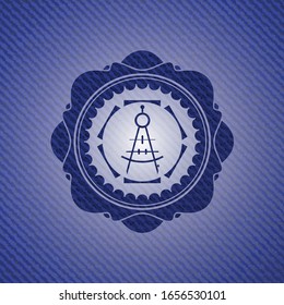 icono de brújula de dibujo dentro del fondo del jean