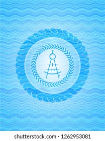 drawing compass icon inside light blue water style badge.