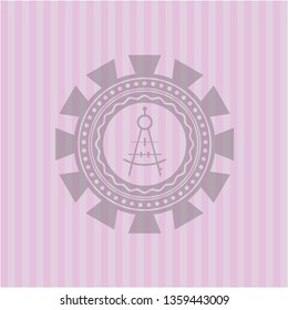 drawing compass icon inside pink emblem