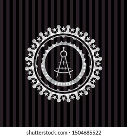 drawing compass icon inside silver emblem