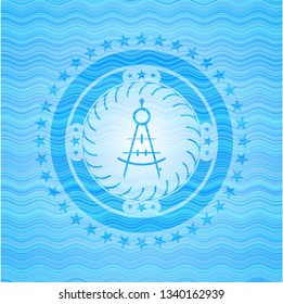 drawing compass icon inside sky blue water wave style emblem.