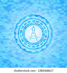 drawing compass icon inside sky blue mosaic emblem