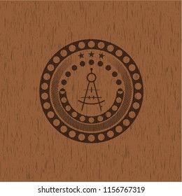 drawing compass icon inside wooden emblem. Vintage.