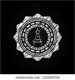 drawing compass icon on chalkboard