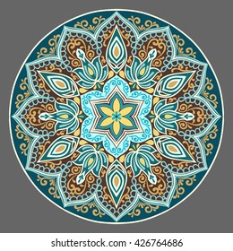 Drawing of a floral  mandala in ethnic style in  turquoise, yellow and brown colors