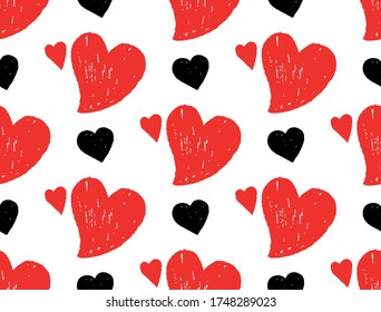 Drawing hearts, red and black. Vector graphics. Seamless texture.
