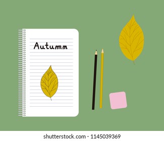 Drawing of a leaf in a notebook with the message: autumn.