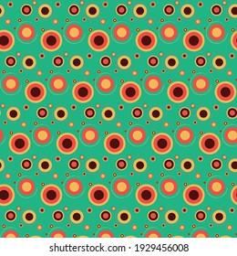 Drawing on a green background.Retro circles. Template. 70x, 80x. Coloring. Factory textiles. Curtains. Linens. Gift paper. Wallpaper for the interior. 