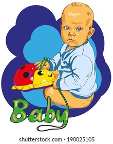 Drawing on the tablet. The child sits with a toy in hands.