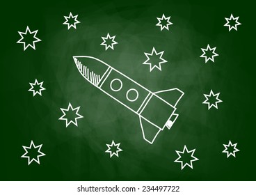 Drawing of rocket on blackboard
