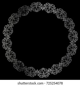drawing of a round silver gradient frame with floral ornament on a black background