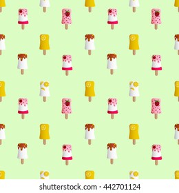 Drawing  of seamless pattern with fruit ice cream in a glaze on a mint background