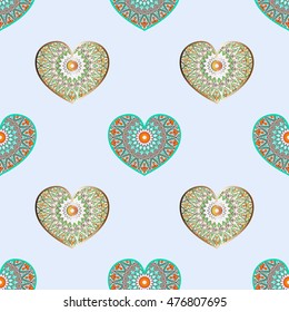 Drawing of a seamless pattern with hearts in turquoise, gold and orange colors, with floral ethnic round ornament on a blue background
