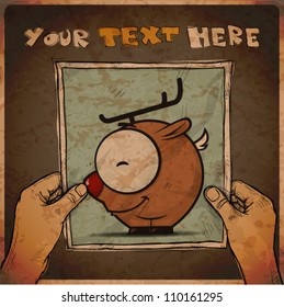 Drawing of a sheet of paper with cartoon dear illustration in hands. Vector.