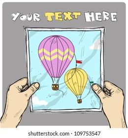 Drawing of a sheet of paper with hot air balloon illustration in hands. Vector.
